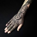 Henna-inspired tattoo on the hand