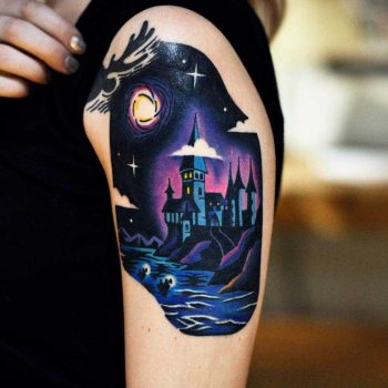 Hogwart's tattoo on the left arm