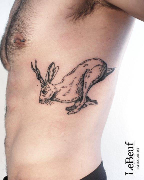 Jumping rabbit tattoo by loïc lebeuf