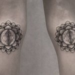 Mandala tattoos on both calves