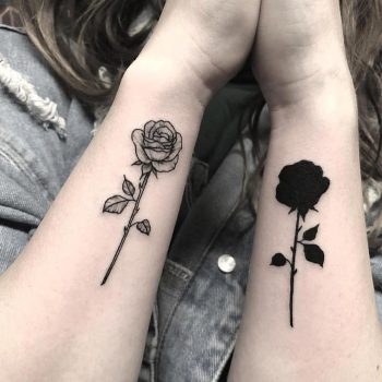 Matching black and white roses