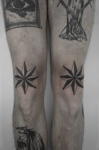 Matching compass rose tattoos