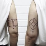 Matching cube tattoos inspired by Joseph Kosuth