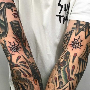 Matching spiderweb tattoos