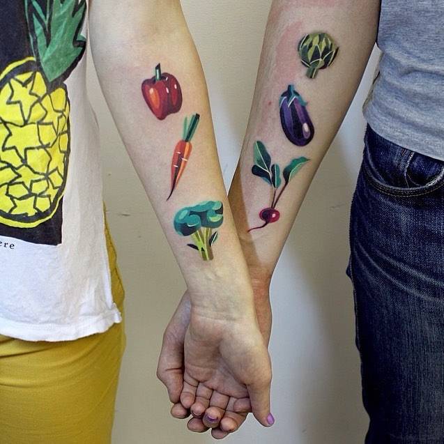 Matching vegetable tattoos for a couple