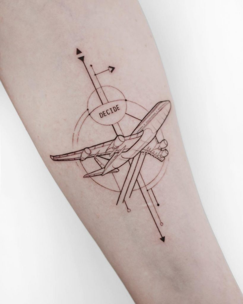 Minimalist airplane tattoo on the forearm