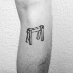 Minimalist trestle tattoo