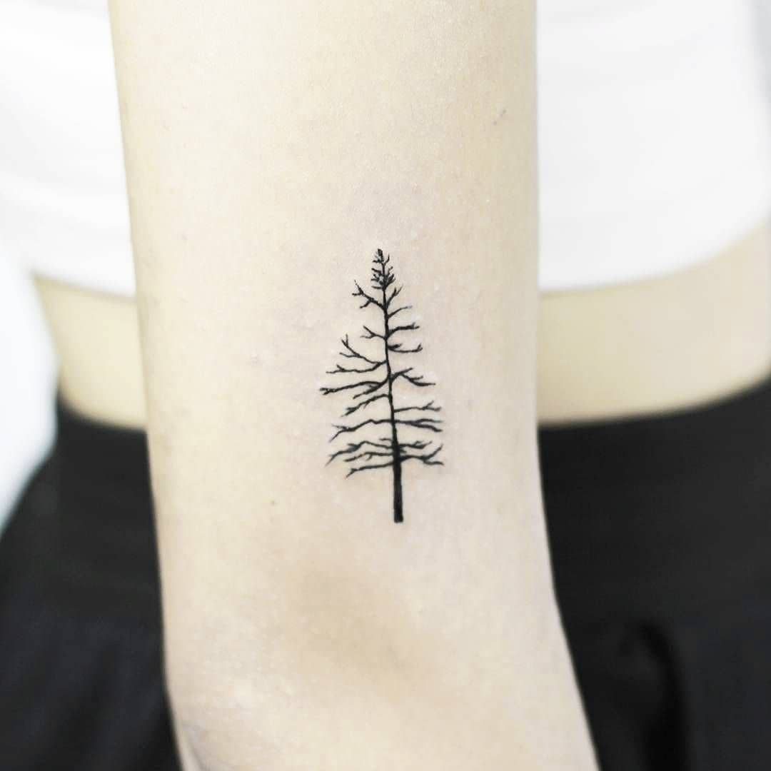 Naked Christmas tree tattoo