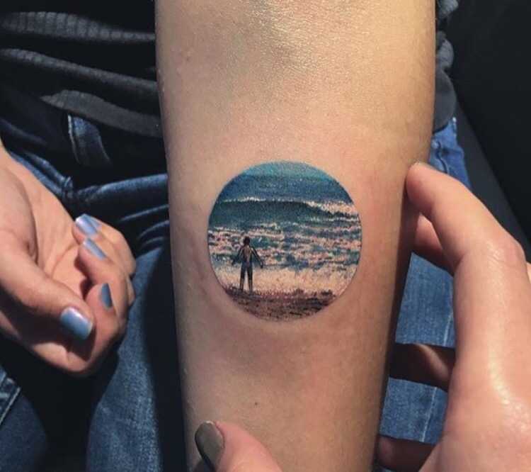 Ocean scenery tattoo by Eva Krbdk