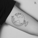 Outline earth globe tattoo