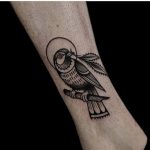 Parrot tattoo by Ethan Jones