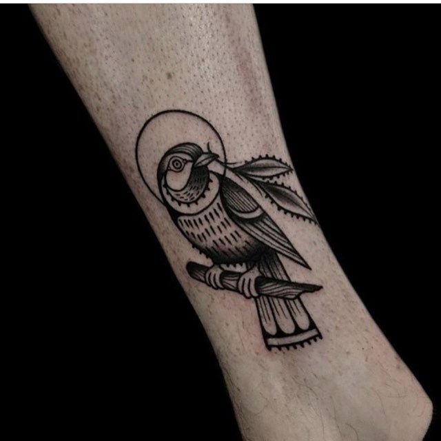 Parrot tattoo by Ethan Jones