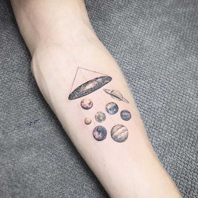 Planets and galaxy tattoo