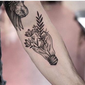 Plants in a lightbulb by Jonas Ribeiro