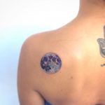 Purple planet tattoo