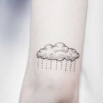 Rain cloud tattoo by Dogma Noir