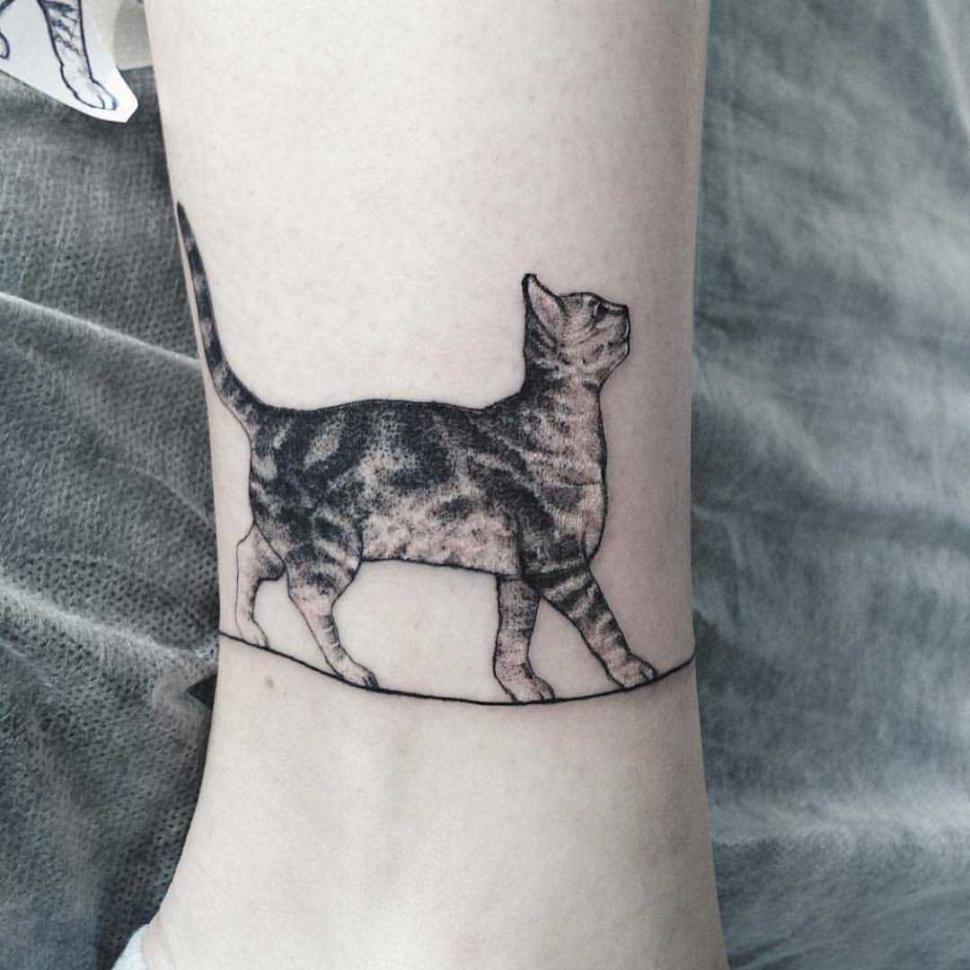 Realistic cat tattoo by Zheremo