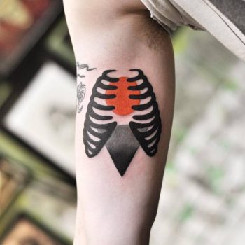 Rib cage tattoo on the arm