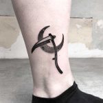 Scythe and crescent moon tattoo