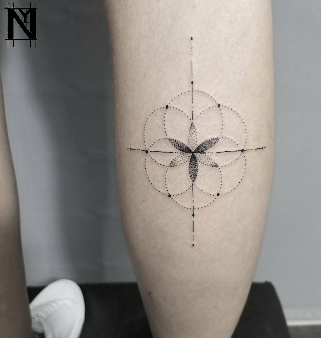 Seed of life tattoo on the calf