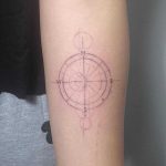 Single needle compass tattoo by Lindsay April