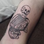 Skeleton accordion player tattoo