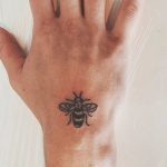 Small bee on the hand