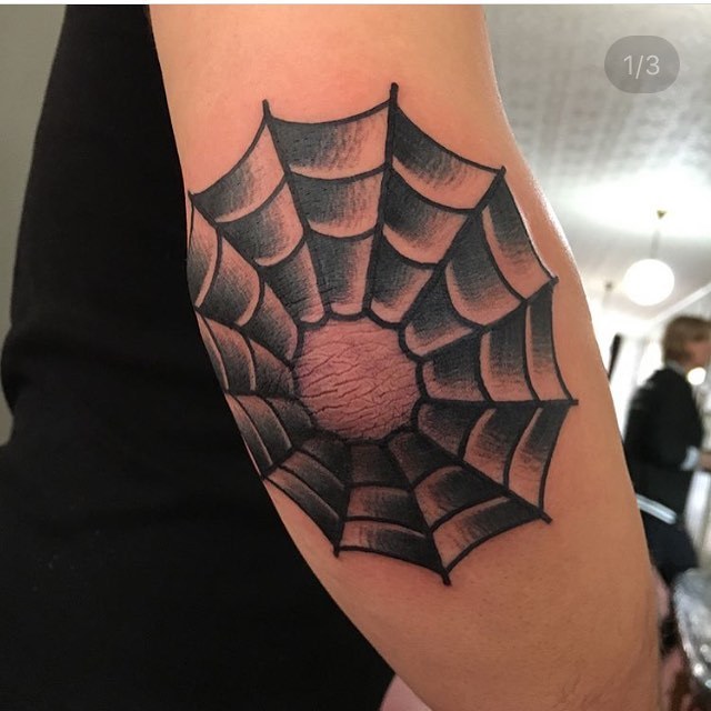 Spider web elbow tattoo by jeroen van dijk