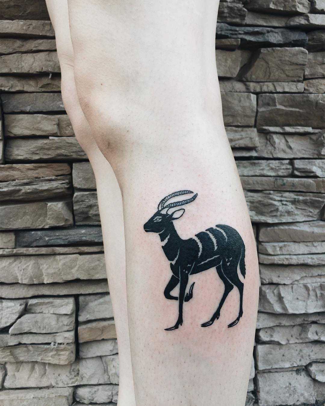Striped antelope tattoo