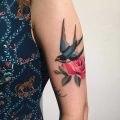 Orange bird tattoo - Tattoogrid.net