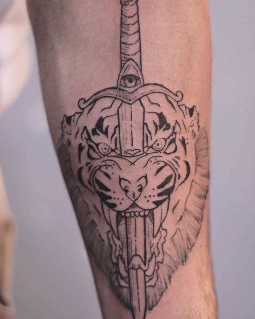 Tiger and sword tattoo by kyle. kyo koko