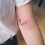 Tiny floral heart by Sol Tattoo