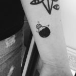 Tiny potion bottle tattoo