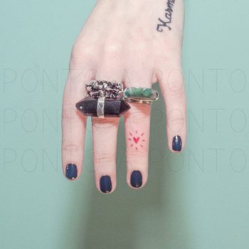Tiny red hand-poked heart