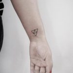 Triforce tattoo by Angie Noir