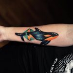 Trippy whale tattoo
