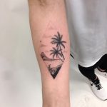 Tropical island scenery tattoo