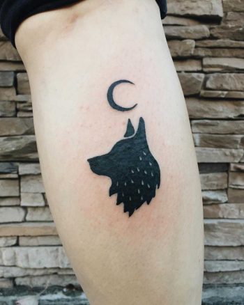 Wolf and crescent moon tattoo