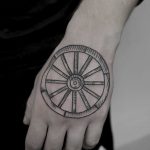 Wooden wheel tattoo