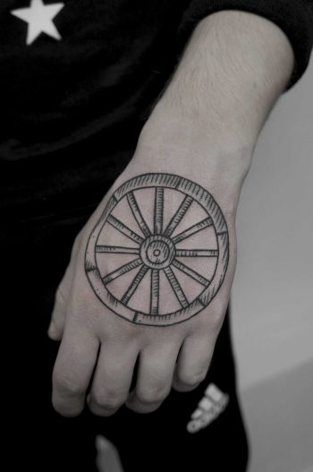 Wooden wheel tattoo