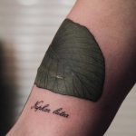 Yellow water lily leaf tattoo