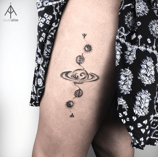Abstract planets tattoo