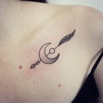 Arrow and moon tattoo done at MU Body Arts