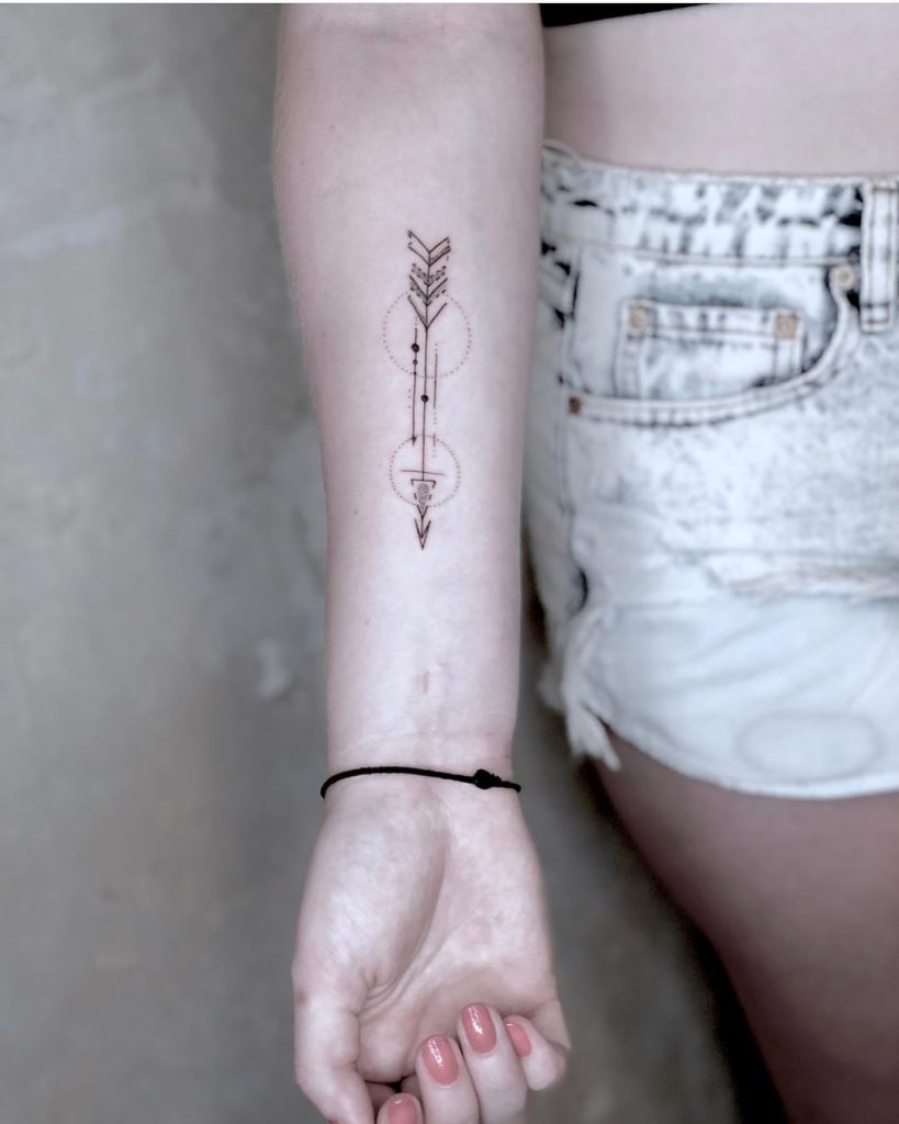Arrow tattoo done by Marvelous Tattooer - Tattoogrid.net