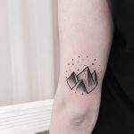Beautiful mountains and stars tattoo