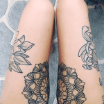 Beautiful symmetrical mandala tattoo on thighs