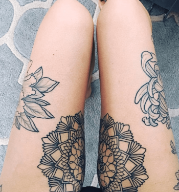 Beautiful symmetrical mandala tattoo on thighs