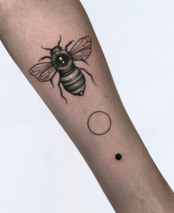 Bee, circle, and dot tattoo