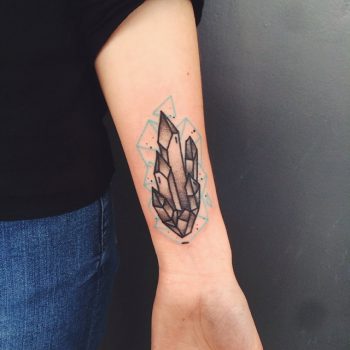 Black and blue crystal tattoo