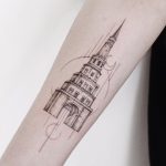 Black and grey tower tattoo